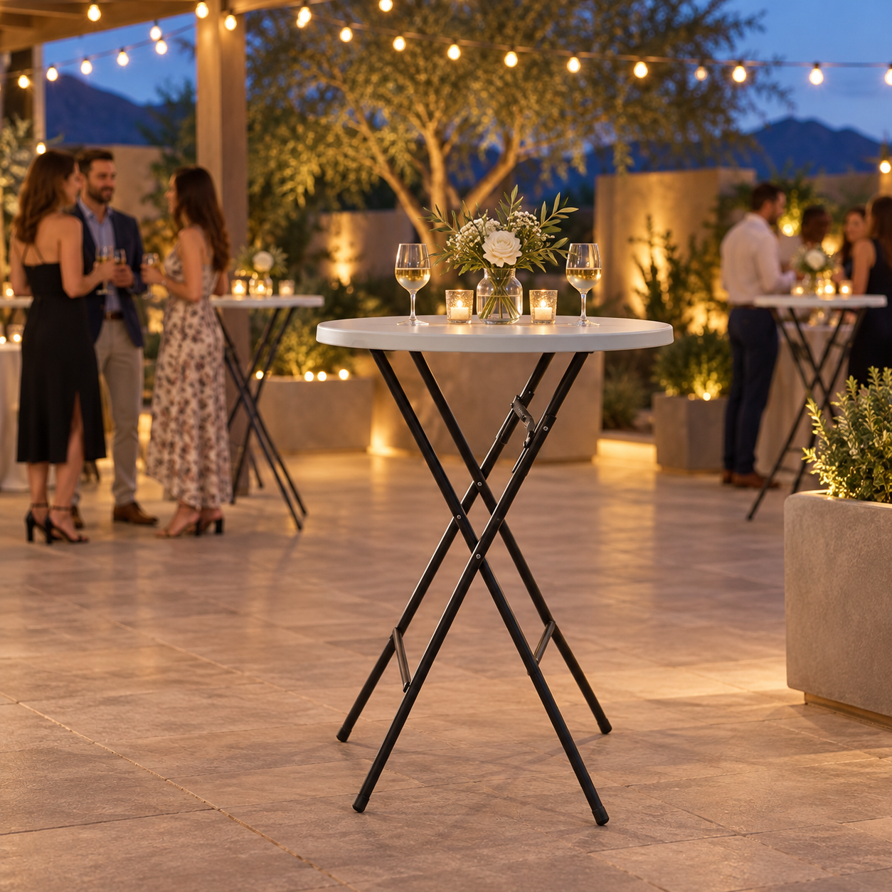 33-inch bar-height cocktail table styled for an evening outdoor event