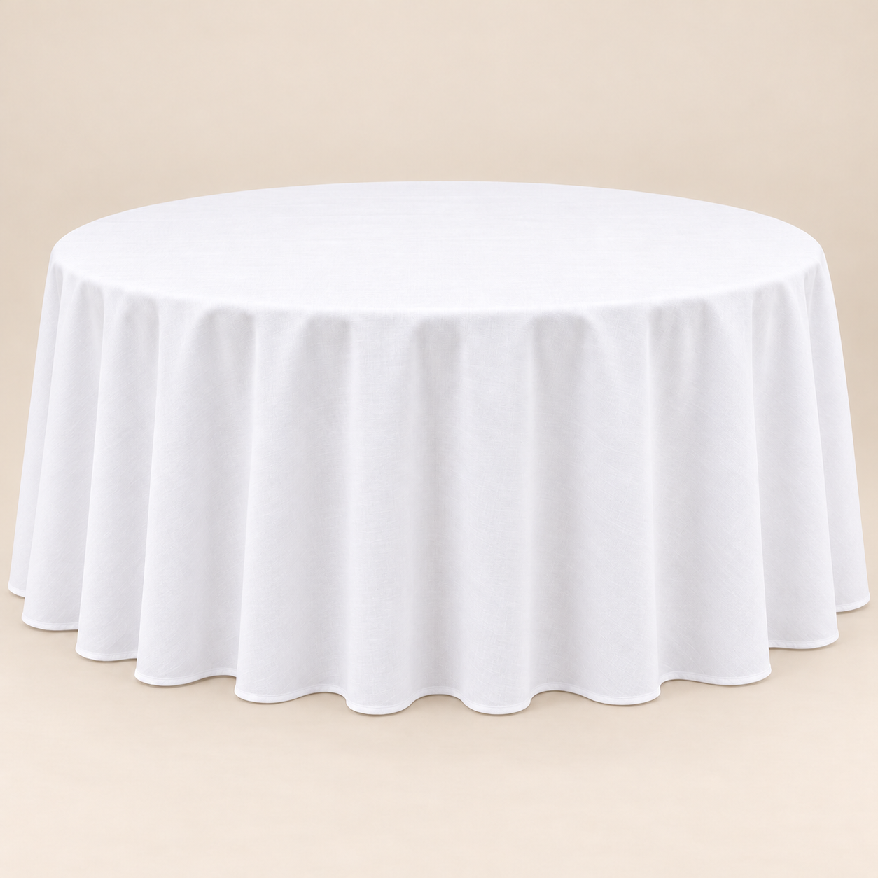 60-inch round table dressed with a white 120-inch floor-length linen that touches the ground and conceals the table legs